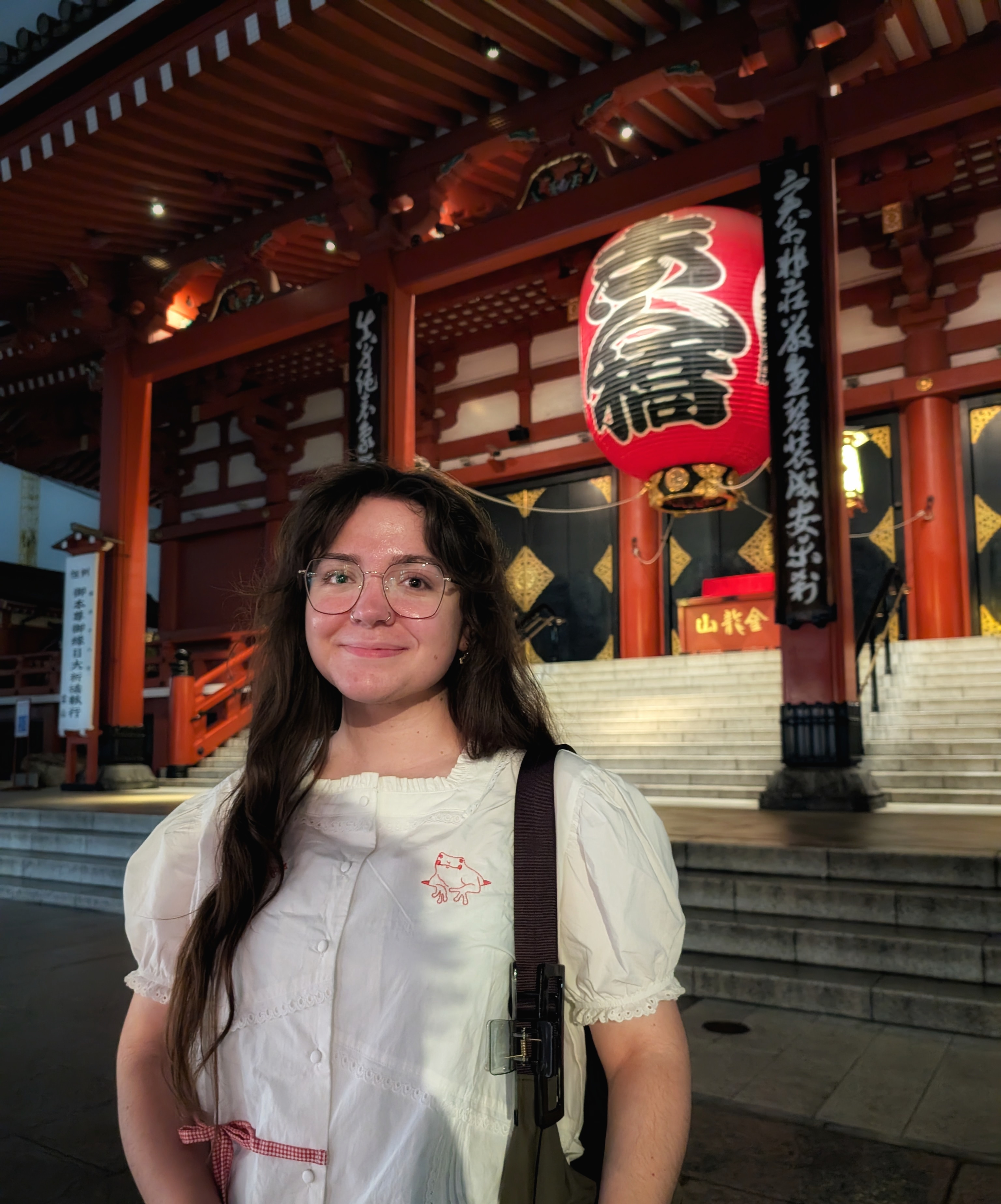 in front of a sensoji lantern in tokyo japan