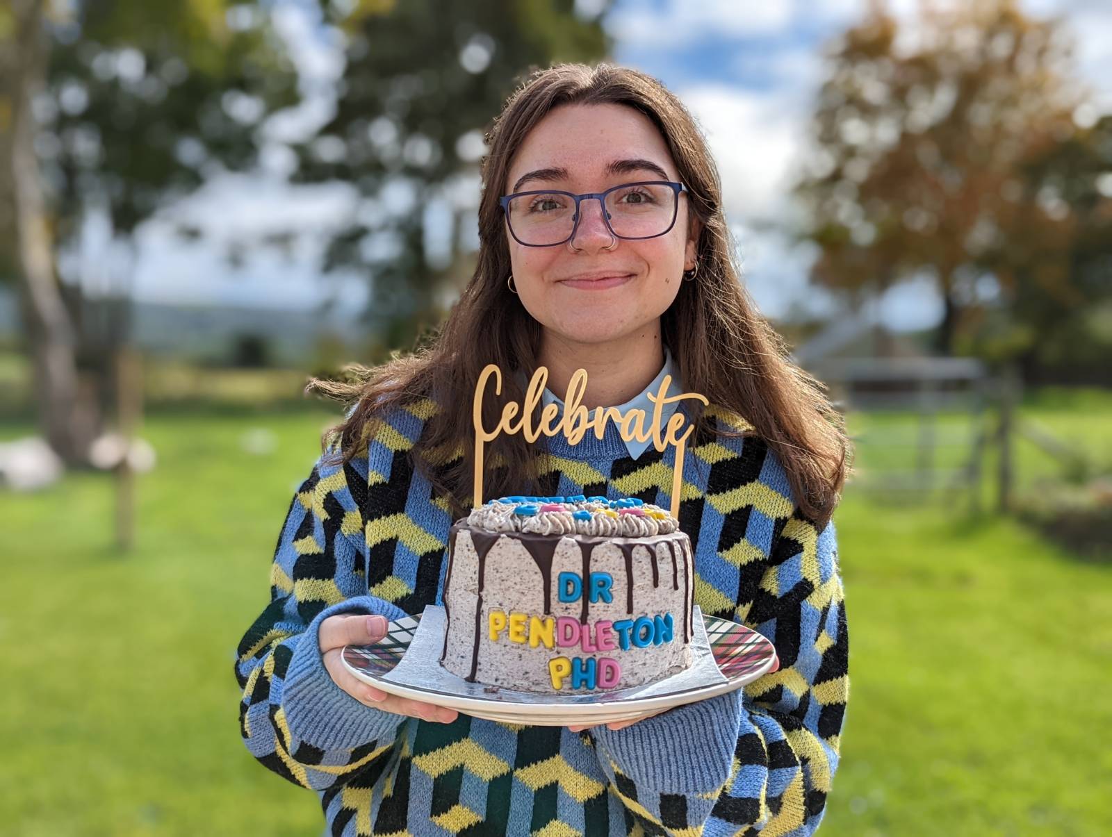 me immediately post viva with my celebration cake